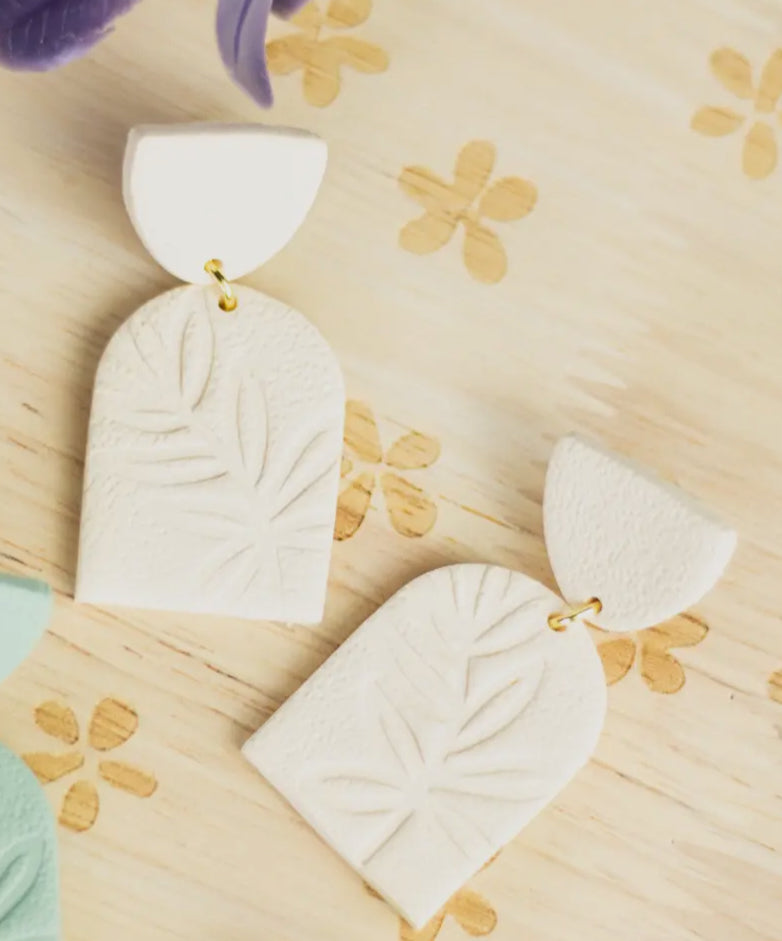 Arched Embossed Dangles
Ivory